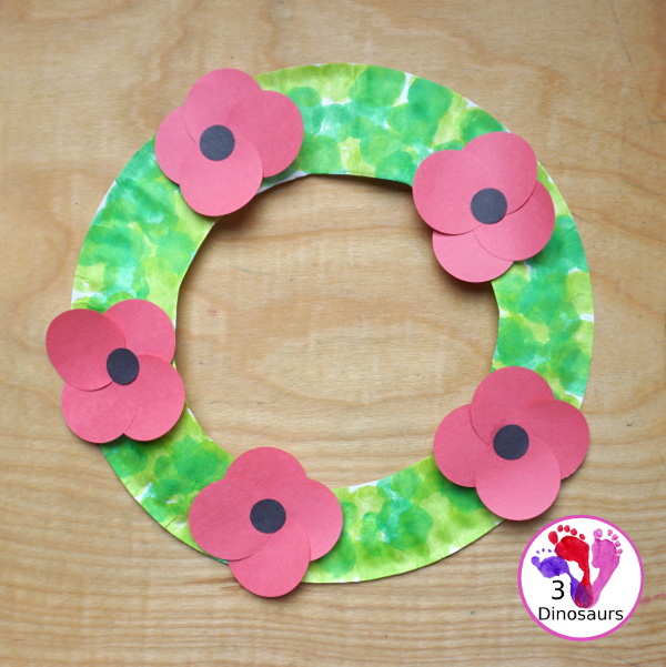 Poppy Flower Wreath Craft for Kids for Veteran's Day. A great way to remember veterans and all they have done. These are great to make for remembrance days, veterans day and memorial day - 3Dinosaurs.com