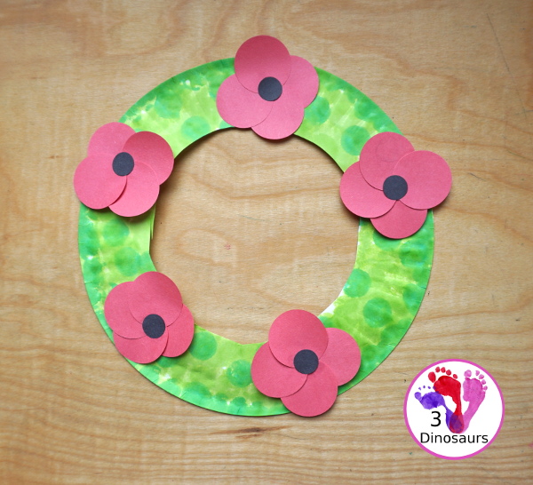 Poppy Flower Wreath Craft for Kids for Veteran's Day. A great way to remember veterans and all they have done. These are great to make for remembrance days, veterans day and memorial day - 3Dinosaurs.com