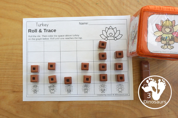 Turkey Roll & Graph With Trace Letters, Numbers & Shapes with a folding die and cube die with a graphing sheet, graphing with tracing numbers, graphing with tracing letters and graphing with tracing shapes. All with a fun turkey theme for Thanksgiving for prek and kindergarten - 3Dinosaurs.com