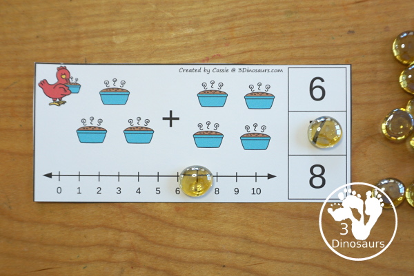 Free Little Red Hen Addition Clip Card Printables: Addition 1 to 10 - with addition with loaves of bread and clip the answers on the side with a number line below to help with the addition. - 3Dinosaurs.com