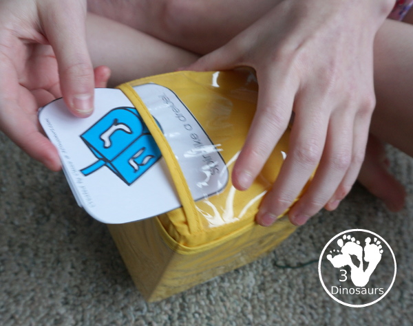 Free Hanukkah Gross Motor Dice - to get kids moving and have fun with easy gross motor movements and fun way to remember parts of the Hanukkah - 3Dinosaurs.com