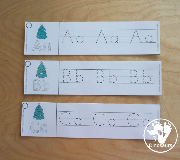 Free Christmas Tree Theme ABC Tracing Strips - with uppercase and lowercase together. You have fun kids with a Christmas Tree plus you can see an example of how to trace the letters - 3Dinosaurs.com