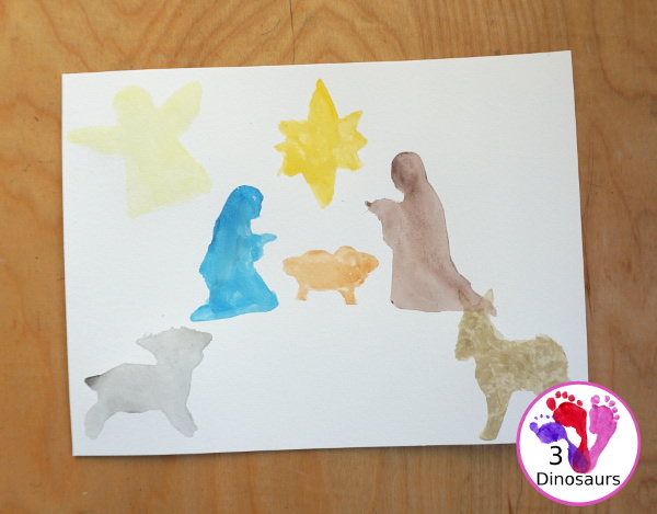 Nativity Watercolor Painting for kids - a simple way to make a Nativity scene with watercolors and cookies cutters. A great way to work on retelling the nativity story - 3Dinosaurs.com