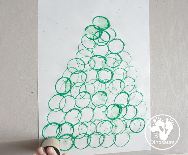 Christmas Tree Paper Roll Painting - a fun painting craft that you can do with kids to make a Christmas tree - 3Dinosaurs.com