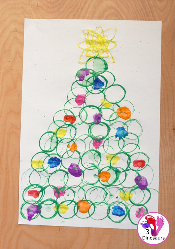 Christmas Tree Paper Roll Painting - a fun painting craft that you can do with kids to make a Christmas tree - 3Dinosaurs.com