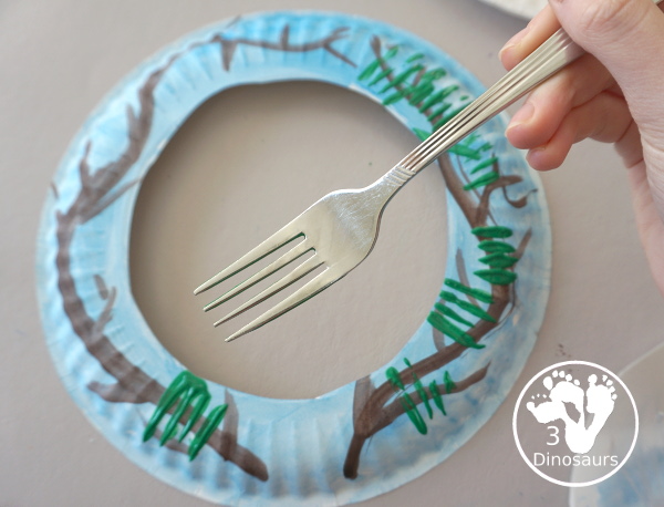 Winter Evergreen Wreath Craft - a fun wreath craft with a evergreen tree in winter with berries and snow.  - 3Dinosaurs.com