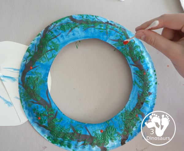 Winter Evergreen Wreath Craft - a fun wreath craft with a evergreen tree in winter with berries and snow.  - 3Dinosaurs.com