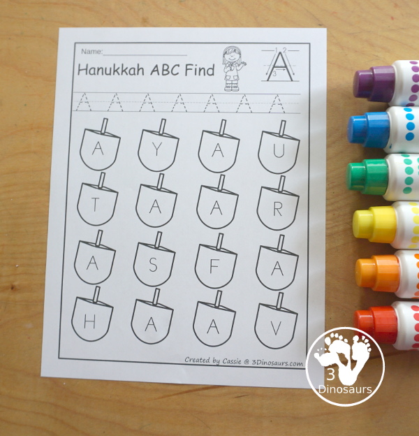 Hanukkah ABC Letter Find Printable - with uppercase letter find and lowercase letter find. You trace the letters and find the letters on the dreidels. A great letter printable for prek and kindergarten - 3Dinosaurs.com