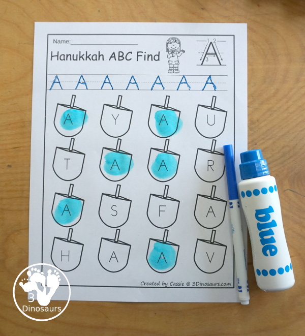 Hanukkah ABC Letter Find Printable - with uppercase letter find and lowercase letter find. You trace the letters and find the letters on the dreidels. A great letter printable for prek and kindergarten - 3Dinosaurs.com