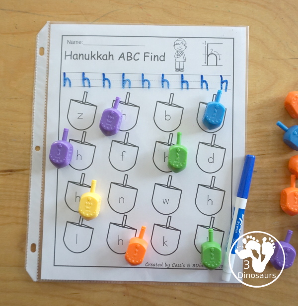 Hanukkah ABC Letter Find Printable - with uppercase letter find and lowercase letter find. You trace the letters and find the letters on the dreidels. A great letter printable for prek and kindergarten - 3Dinosaurs.com