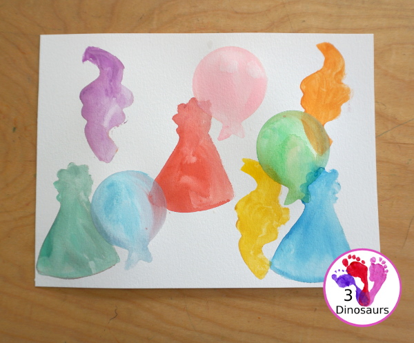 Party Watercolor Painting with Cookie Cutters - a simple cookie cutter painting with party themed cookie cutters that is great for a party and also New years - 3Dinosaurs.com