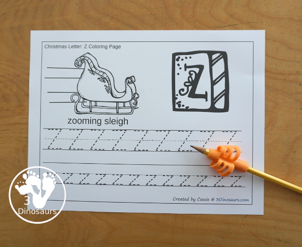 Free Christmas Themed ABC Tracing - print and cursive options with all 26 letters. You have an uppercase and lowercase letters to trace. There is also one or two pictures for each Letter for Christmas - 3Dinosaurs.com