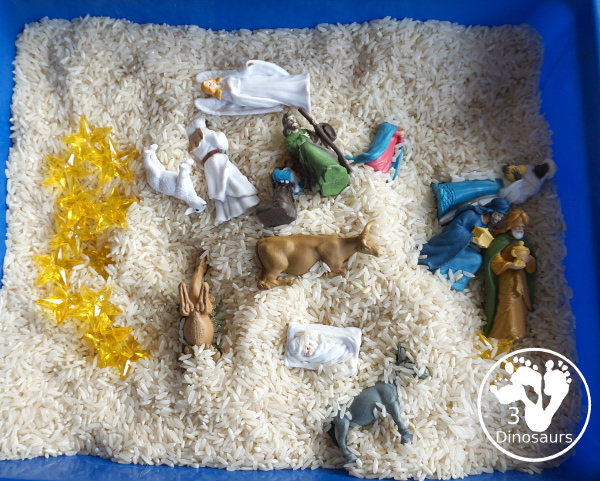 Nativity Sensory Bin For Christmas - a simple sensory bin to explore parts of the nativity with kids. You have nativity figures, rice and stars in this Christmas sensory bin. - 3Dinosaurs.com