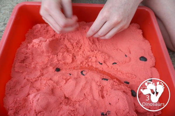 Mars Themed Sensory Bin with kinetic sand - a fun way to explore the red planet Mars -  3Dinosaurs.com