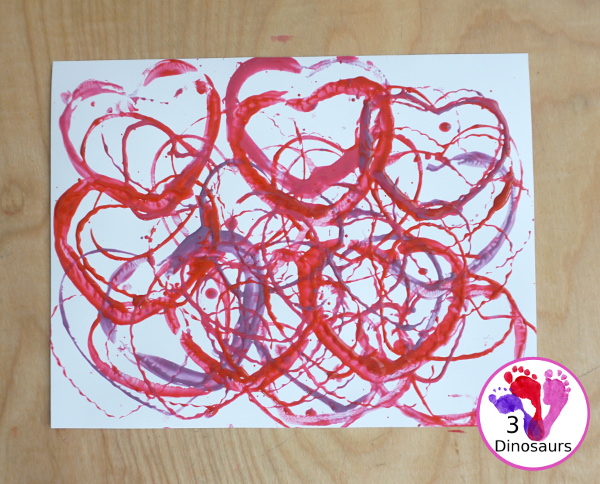 Heart Cookie Cutter Painting - a super easy craft for kids to do with cookie cutters and paint that you can do with tot, preschool and kindergarten - 3Dinosaurs.com