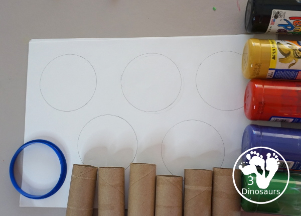 Paper Roll Olympic Rings Painting - an easy Olympic craft that you can use with kids to make an Olympic flag - 3Dinosaurs.com