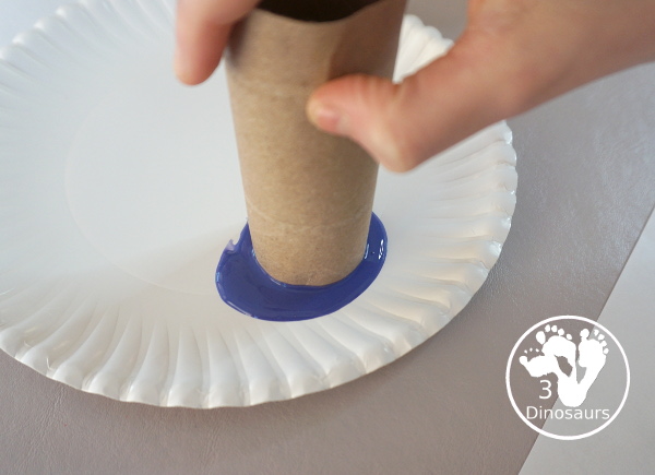 Paper Roll Olympic Rings Painting - an easy Olympic craft that you can use with kids to make an Olympic flag - 3Dinosaurs.com