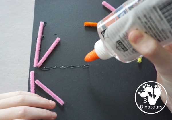 Pipe Cleaner Fireworks - an easy to make fireworks craft made with cut up pipe cleaners and glue. - 3Dinosaurs.com