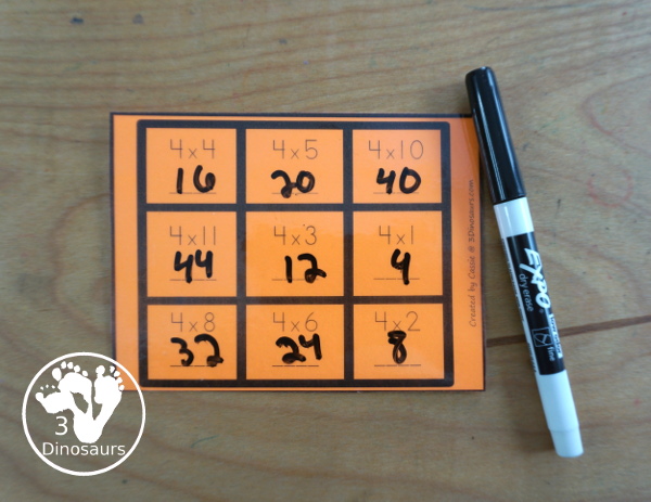 Free Multiplication Tic Tac Toe Printable - with four games boards for multiplication 1 to 12 - with 3 x 3 games for solving the equation games for kids to work on multiplication math facts - 3Dinosaurs.com