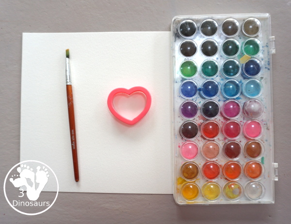 Rainbow Heart Watercolor Painting - a fun heart shape cookie cutter painting you can do with kids. - 3Dinosaurs.com