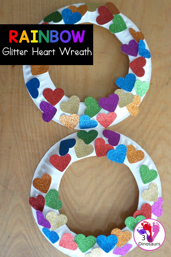 Rainbow Heart Wreath - made with glitter hearts and a paper plate that is super simple to put together for  heart theme of Valentines - 3Dinosaurs.com