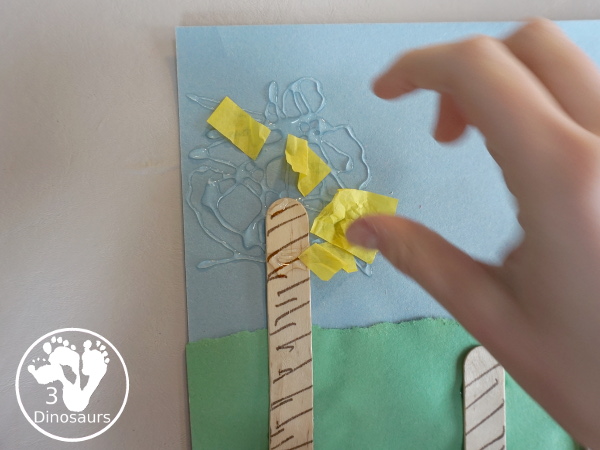 Tissue Paper Truffula Tree Craft you can make to go with the book the Lorax. It is simple for kids of different ages to make for a Dr Seuss Craft. - 3Dinosaurs.com