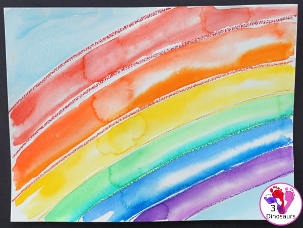 Watercolor Rainbow Process Art - kids can great creative and explore how water spreads things out with this craft for St. Patricks Day or springtime  - 3Dinosaurs.com