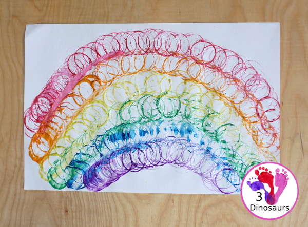 Paper Roll Rainbow Painting - a simple rainbow painted with paper rolls this is a great rainbow, spring and St. Patrick's Day craft - 3Dinosaurs.com