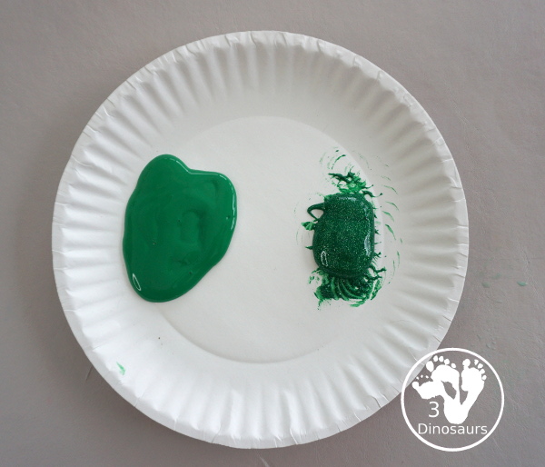 Clover Stamping Painting For Kids - a fun cookie cutter painting for kids with clover cookie cutters a fun St. Patrick's Day activities for kids - 3Dinosaurs.com