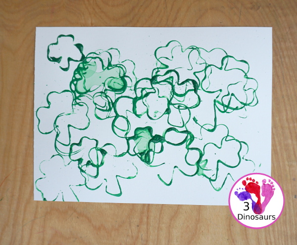 Clover Stamping Painting For Kids - a fun cookie cutter painting for kids with clover cookie cutters a fun St. Patrick's Day activities for kids - 3Dinosaurs.com