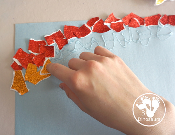 Torn Paper Glitter Rainbow Craft - a simple rainbow you can make with torn glitter paper. A simple rainbow for kids tot to kindergarten - 3Dinosaurs.com