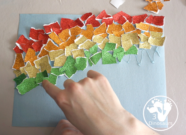 Torn Paper Glitter Rainbow Craft - a simple rainbow you can make with torn glitter paper. A simple rainbow for kids tot to kindergarten - 3Dinosaurs.com