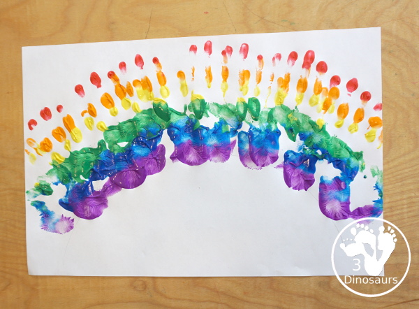 Hand Print Rainbow- you can make a rainbow with paint and a hand and it is fun for kids to make the rainbow. This is great for spring and St Patrick's day