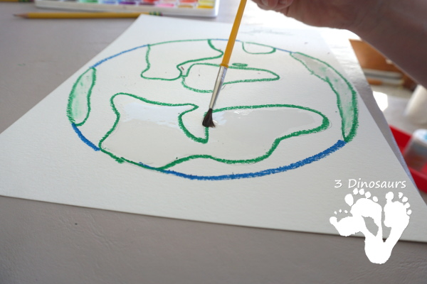 Watercolor Planet Earth Process Art - An easy and fun art project for planet Earth using watercolors and oil pastels - 3Dinosaurs.com