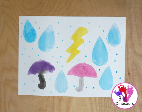 Rain Themed Water Color Cookie Painting - a fun watercolor painting with rain themed cookie cutters. - 3Dinosaurs.com