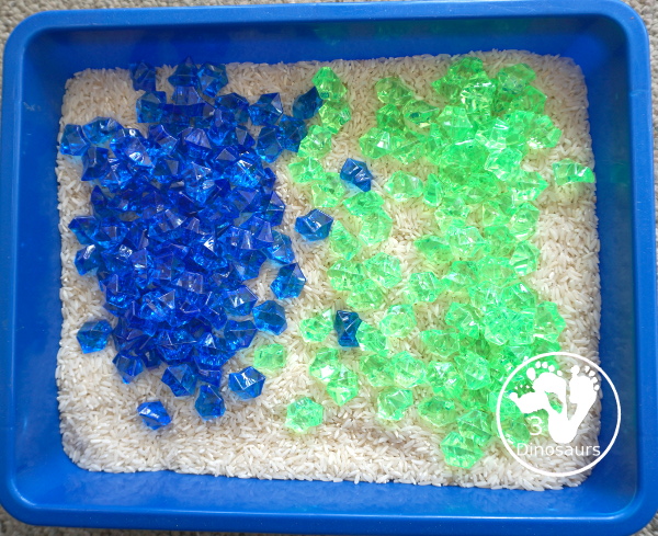 Blue and Green Sensory Bin For Earth Day - a look at the items we put in the sensory bin with easy to see - 3Dinosaurs.com