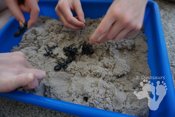 Fun Sensory Play in an Ant & Kinetic Sand Sensory Bin - an easy to set up and play in sensory bin for kids with an ant theme - 3Dinosaurs.com