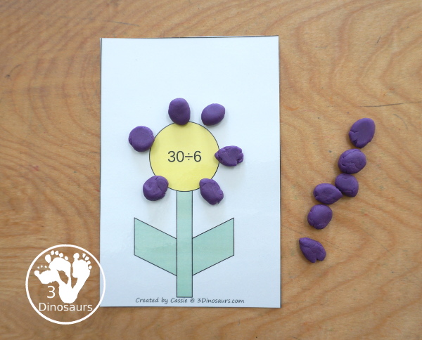 Free Flower Division Mat Printables - with 12 division flower mats for each number 1 to 12. You have two playdough mats on each page, where kids solve each division problem by making that make flower petals for the answer for each division mat - 3Dinosaurs.com