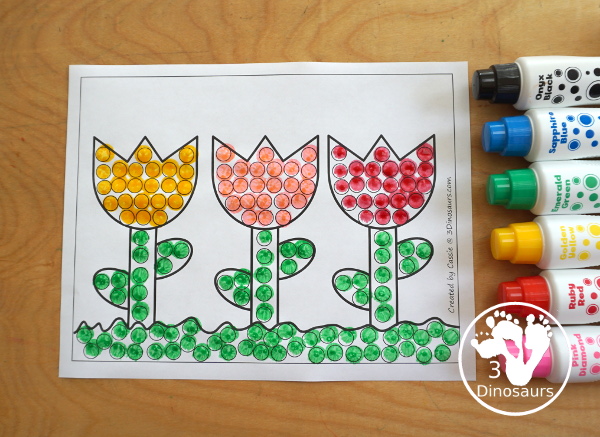 Free Tulip Fine Motor Mat Printables - with two versions of a tulip for different skill levels with a single tulip flower and three flowers on a page with ground, stem, and leaves - you have a flower template printable, flower tracing printable, flower dot marker printable, and flower q-tip printable - 3Dinosaurs.com