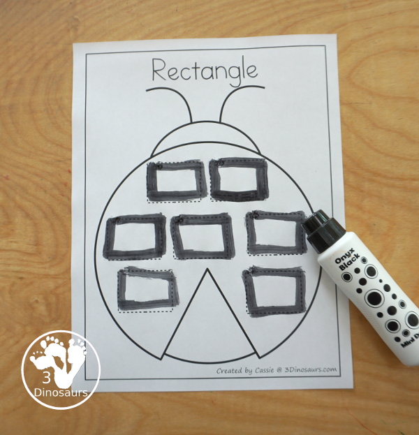 Free Ladybug Shape Tracing Printable - with 9 shapes for kids to trace on the back on the ladybug. A great shape fine motor activity for kids. - 3Dinosaurs.com