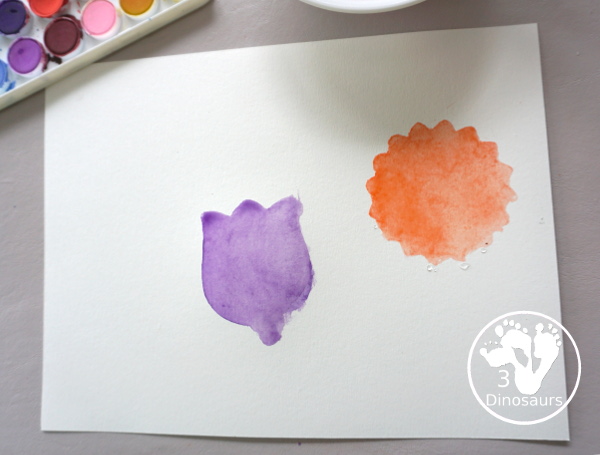 Watercolor Flower Painting with Cookie Cutters - a fun way for kids of all ages to paint flowers and have a fun time making a page full of flowers for spring or mothers day - 3Dinosaurs.com