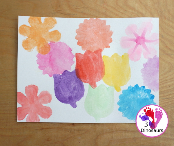 Watercolor Flower Painting with Cookie Cutters - a fun way for kids of all ages to paint flowers and have a fun time making a page full of flowers for spring or mothers day - 3Dinosaurs.com