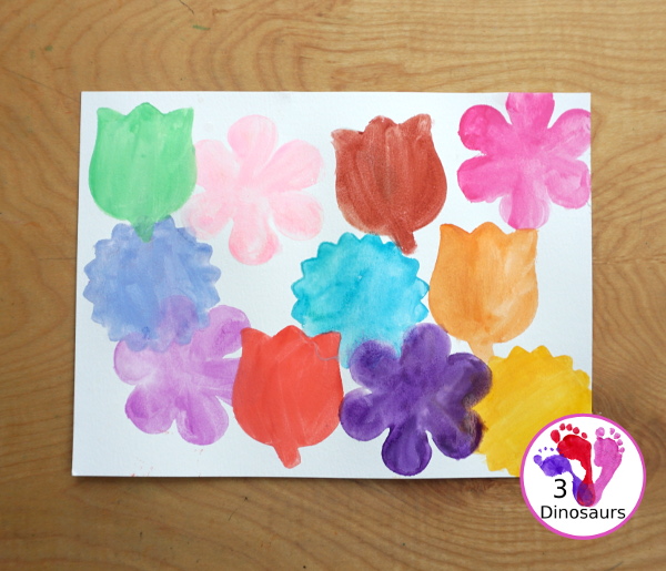 Watercolor Flower Painting with Cookie Cutters - a fun way for kids of all ages to paint flowers and have a fun time making a page full of flowers for spring or mothers day - 3Dinosaurs.com