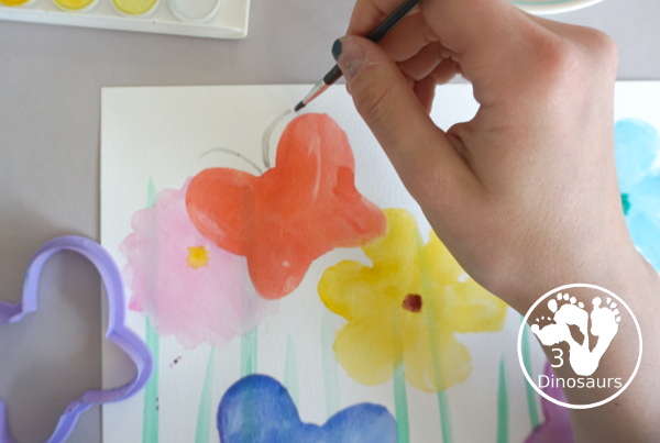 Watercolor Butterfly & Flower Painting is a fun watercolor painting with butterfly and flower cookie cutters - 3Dinosaurs.com