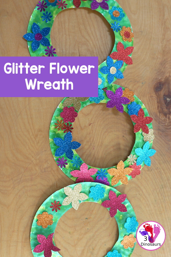 Flower Glitter Wreath Craft - a fun wreath made with a paper plate and flitter flower made from crafts punches.- 3Dinosaurs.com