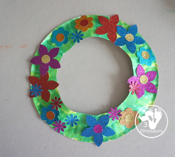 Flower Glitter Wreath Craft - a fun wreath made with a paper plate and flitter flower made from crafts punches.- - All the supplies that you need for the craft - 3Dinosaurs.com