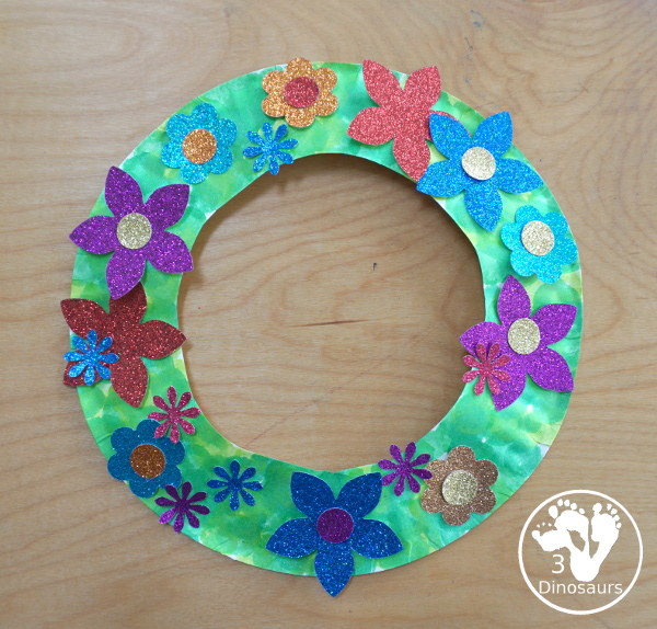 Flower Glitter Wreath Craft - a fun wreath made with a paper plate and flitter flower made from crafts punches.- - All the supplies that you need for the craft - 3Dinosaurs.com