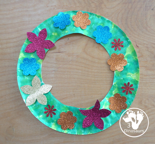 Flower Glitter Wreath Craft - a fun wreath made with a paper plate and flitter flower made from crafts punches.- - All the supplies that you need for the craft - 3Dinosaurs.com