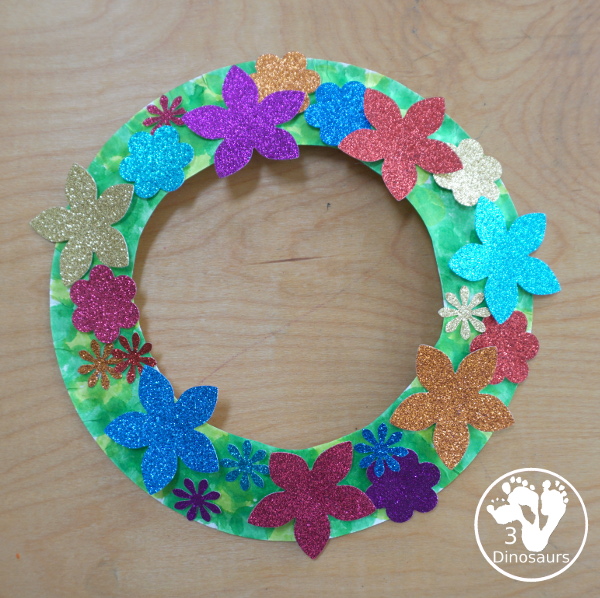 Flower Glitter Wreath Craft - a fun wreath made with a paper plate and flitter flower made from crafts punches.- - All the supplies that you need for the craft - 3Dinosaurs.com