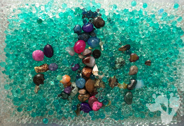 Rock & Water Bead Sensory Bin - a great hands-on play with rocks and sensory bins for kids of all ages - 3Dinosaurs.com #sensorybin #sensoryplay